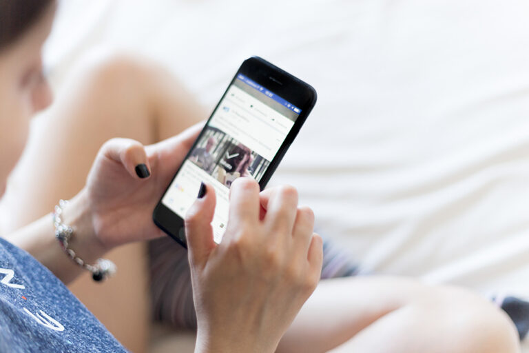 Holding smartphone